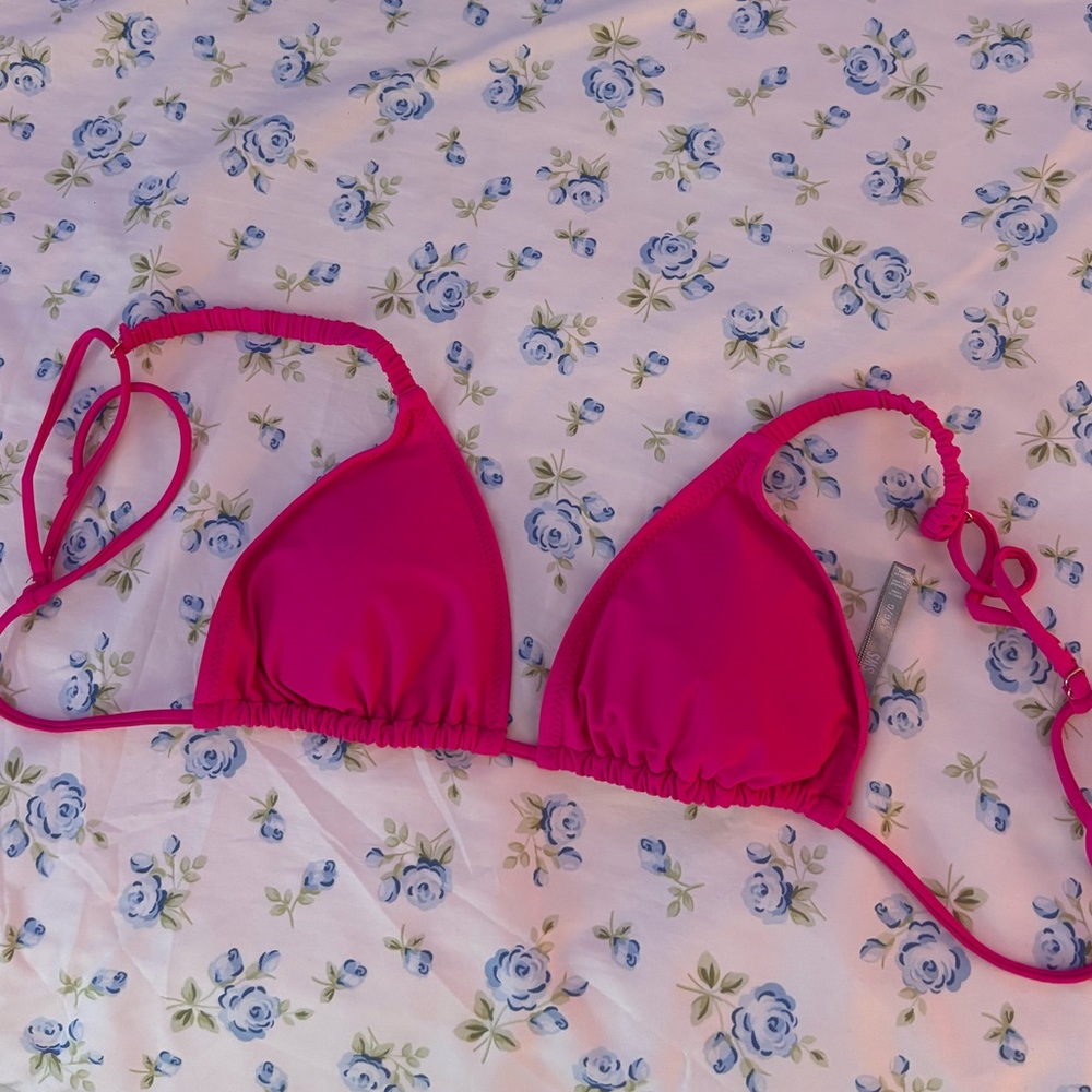 Pink bikini top with adjustable straps